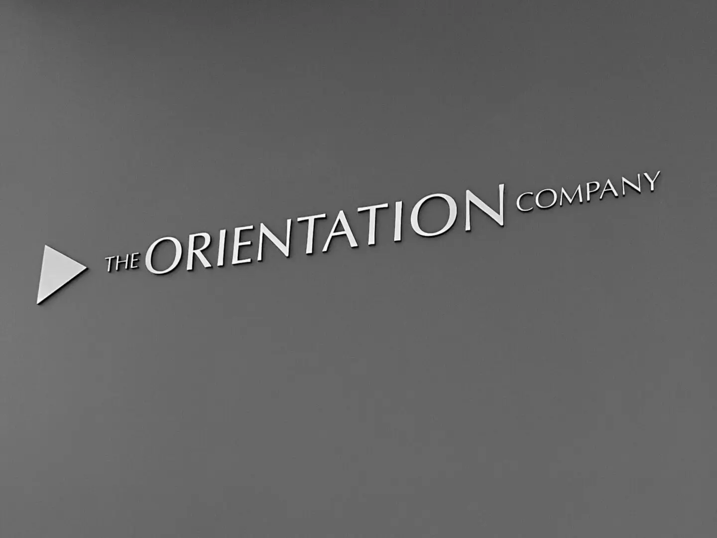 A sign that says the orientation company.